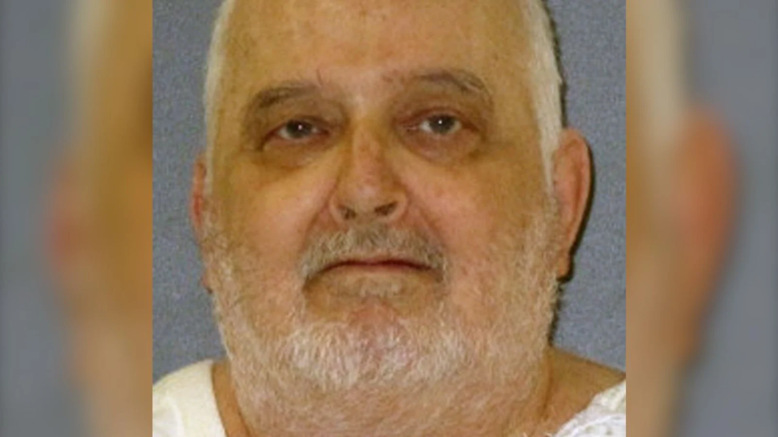 Danny Bible, older and white-bearded, in a prison photograph