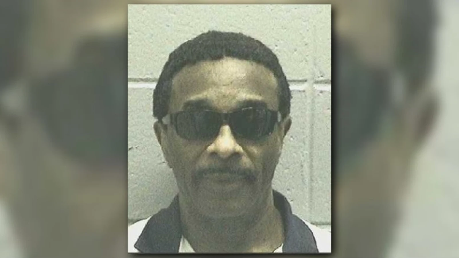 Carlton Gary in tinted glasses in a Georgia Department of Corrections photograph