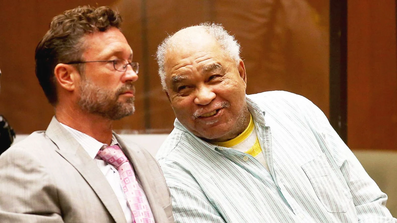 Samuel Little seated beside his lawyer in a Los Angeles courtroom