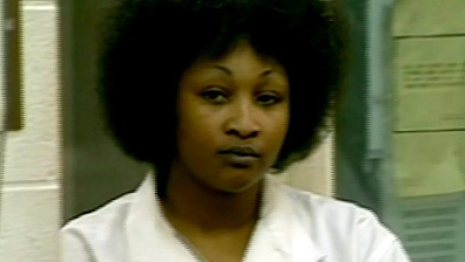 Kimberly McCarthy in a white prison uniform
