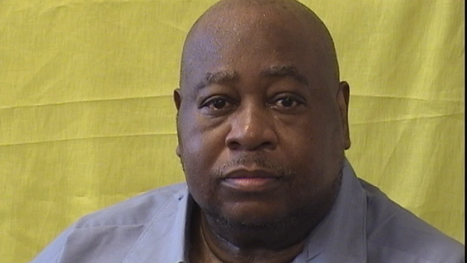 Dellmus Colvin in a blue prison shirt in an Ohio prison photograph