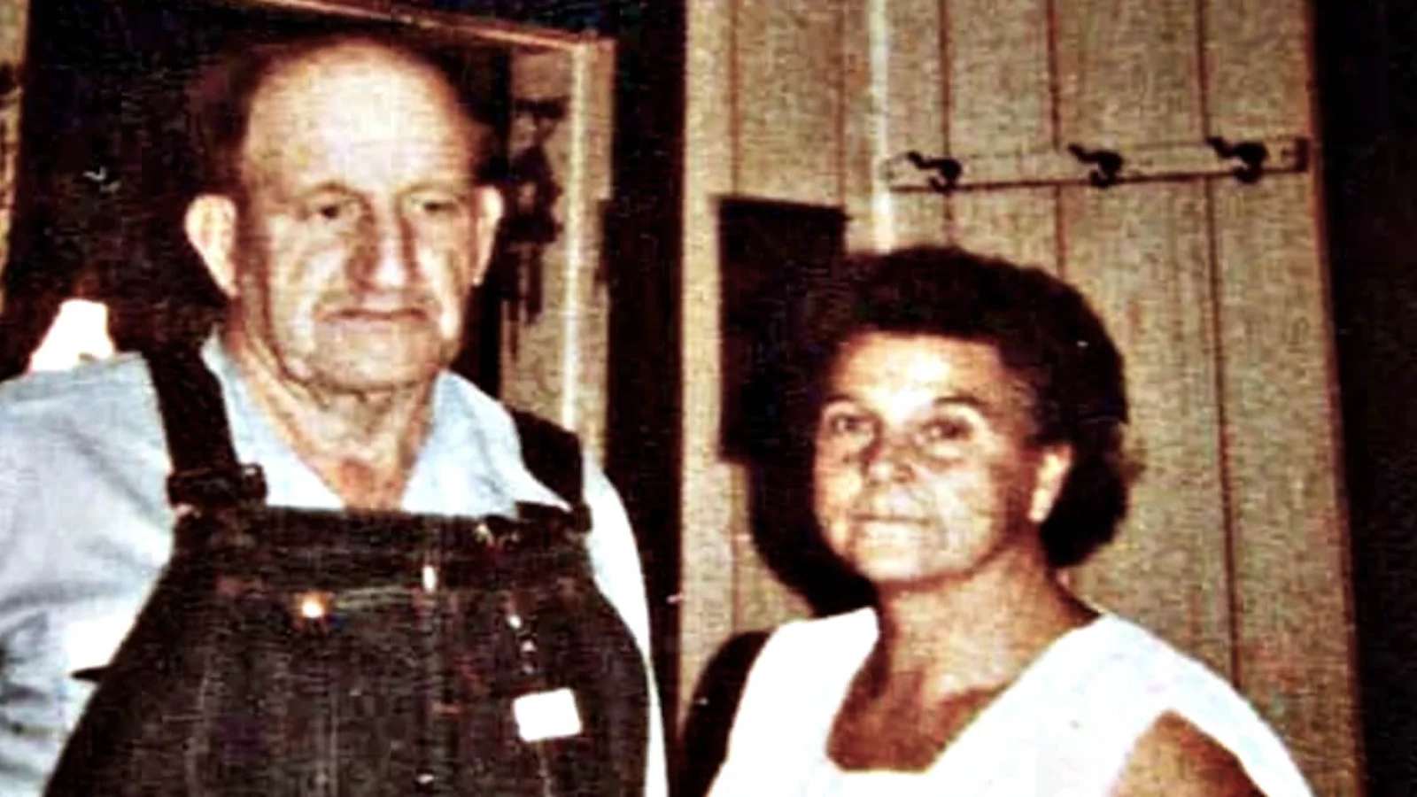 Faye Copeland beside her husband, Ray, in overalls, in a photograph from the 1980s