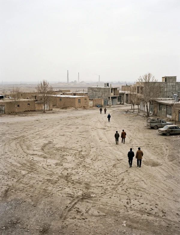 Illustration of a few men walking across a dusty, empty town square on the edge of a desert town in Iran, brick kilns behind. Not an actual scene from the case.